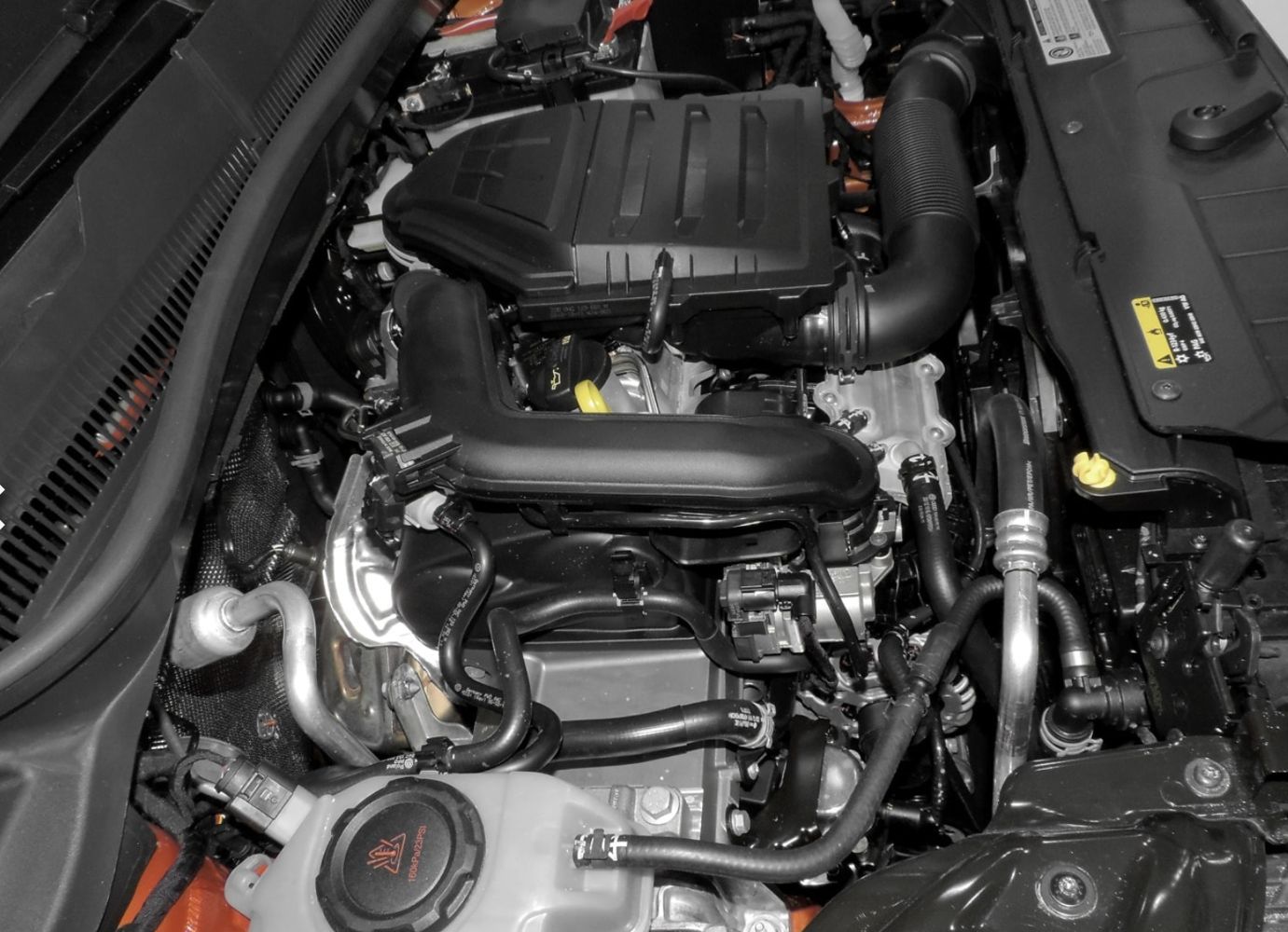 under-hood inspection on vehicle parked on narrow Savannah historic district block