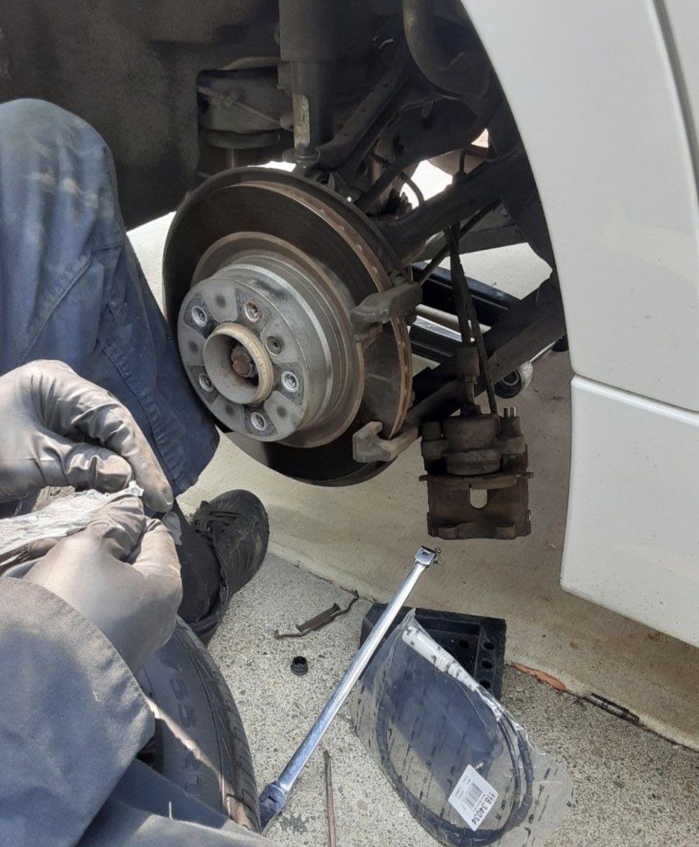 Brake job in progress at a Savannah driveway
